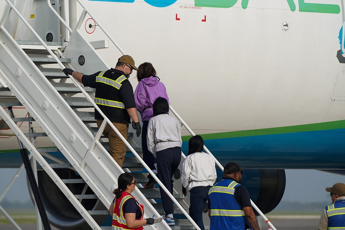 Colombian women board a repatriation flight to their country, in Harlingen, Texas, U.S. February 28, 2024.  (OSV News photo/Veronica Gabriela Cardenas, Reuters).