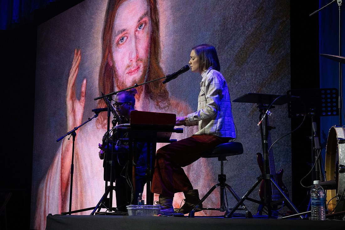 Songwriter Sarah Kroger sings during Eucharistic adoration for Life Fest at the D.C. Armory in Washington Jan. 19, 2024, ahead of the annual March for Life. Kroger is among the artists performing at the National Eucharistic Congress taking place at Lucas Oil Stadium in Indianapolis July 17-21. (OSV News photo/Jeffrey Bruno, Knights of Columbus)