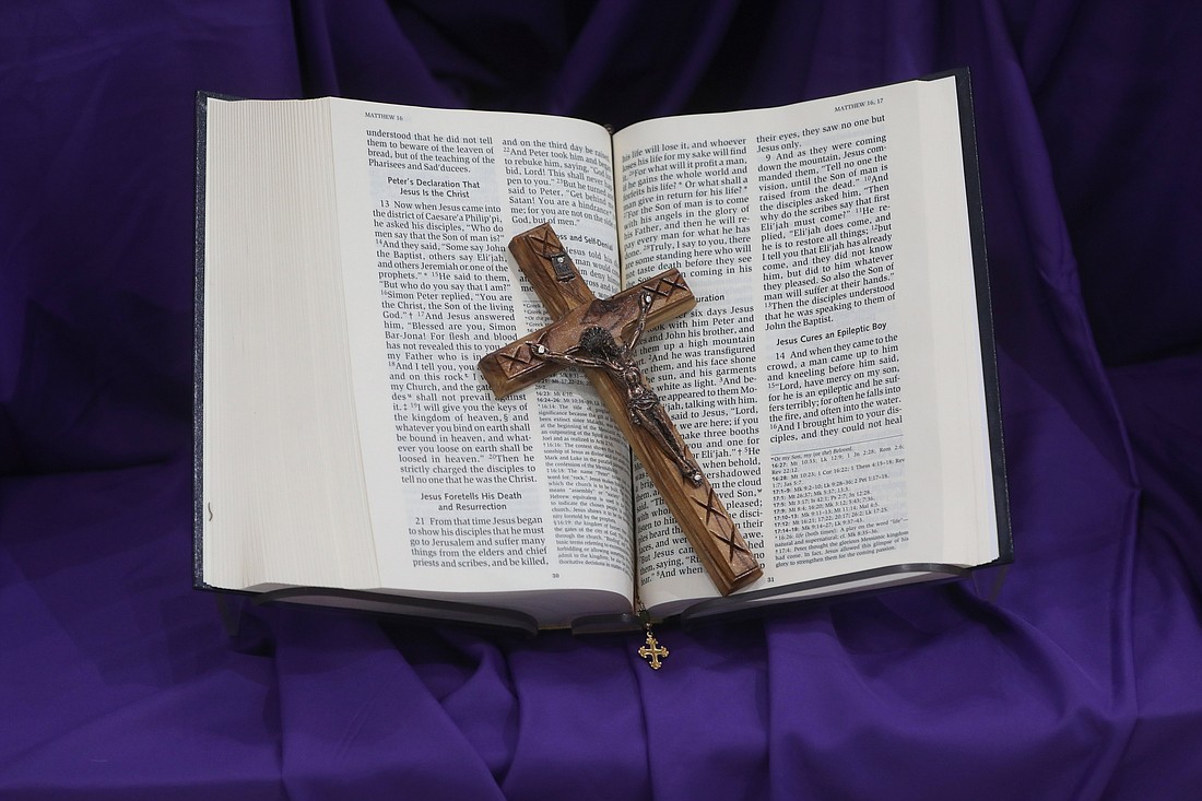 A crucifix and Bible are pictured during Lent at Jesus the Good Shepherd Church in Dunkirk, Md., April 7, 2022. (CNS photo/Bob Roller, Reuters)