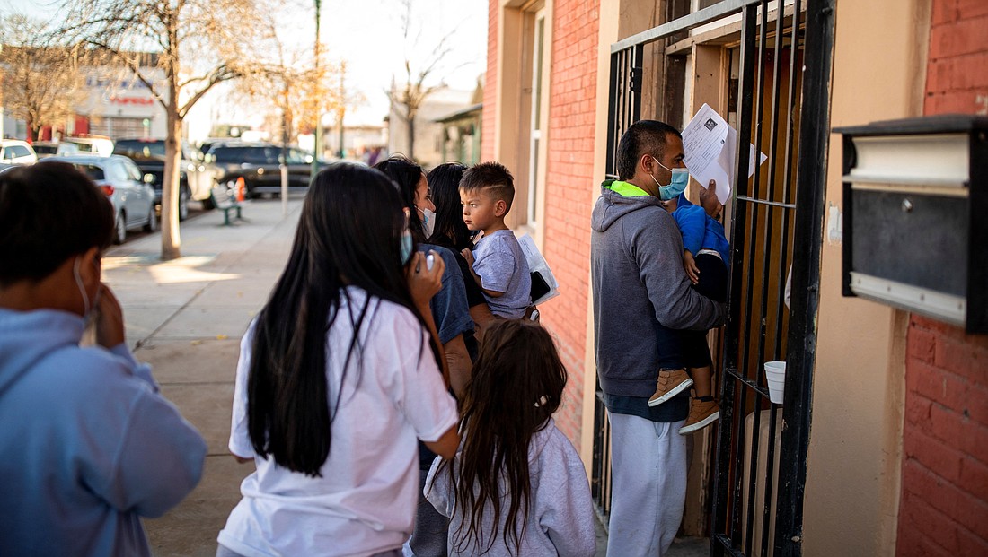 A migrant family is dropped off Dec. 13, 2022, at a local migrant shelter run by the Annunciation House in downtown El Paso, Texas. A state judge ruled July 2, 2024, that Texas Attorney General Ken Paxton's effort to shut down Annunciation House, a Catholic nonprofit serving migrants, violated the Texas Religious Freedom Restoration Act. (OSV News photo/Ivan Pierre Aguirre, Reuters)