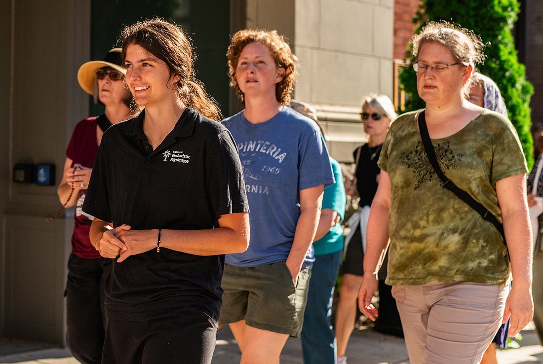 Marina Frattaroli, a perpetual pilgrim on the National Eucharistic Pilgrimage's eastern St. Elizabeth Ann Seton Route, walks in a Eucharistic procession through downtown Cincinnati July 6, 2024. (OSV News Photo/Jake Emser, courtesy Archdiocese of Cincinnati)