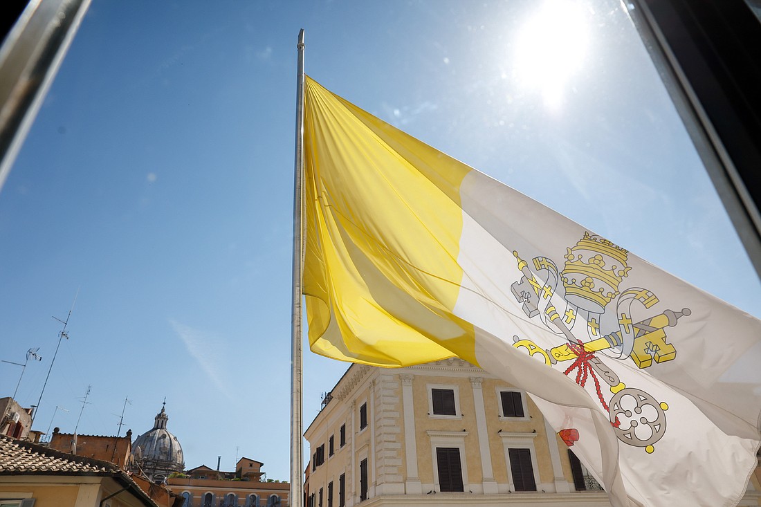 A Vatican flag waves outside the Palazzo della Cancelleria, a Vatican-owned building in Rome, which houses several Vatican tribunals, Sept. 12, 2023. (CNS photo/Lola Gomez)