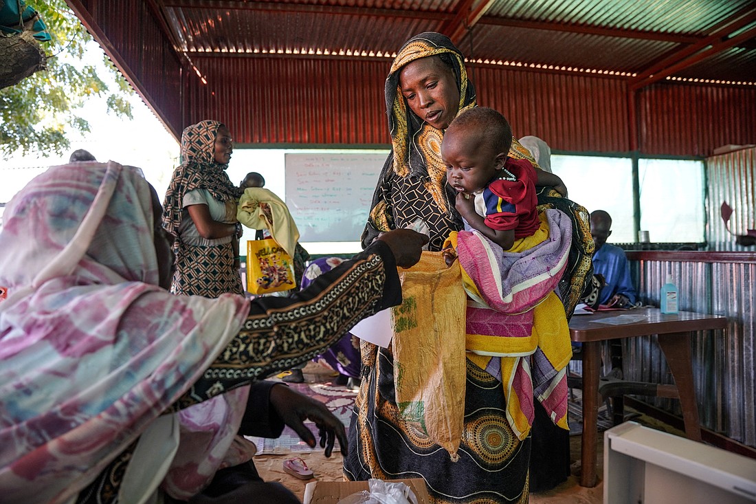 A woman and baby are pictured in a January 2024 photo at the Zamzam displacement camp close to El Fasher in North Darfur, Sudan. (OSV News photo/Mohamed Zakaria, MSF handout via Reuters) THIS IMAGE HAS BEEN SUPPLIED BY A THIRD PARTY. MANDATORY CREDIT..