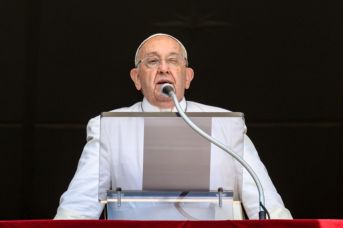 Pope Francis speaks to visitors gathered in St. Peter’s Square to pray the Angelus at the Vatican July 14, 2024. (CNS photo/Vatican Media)