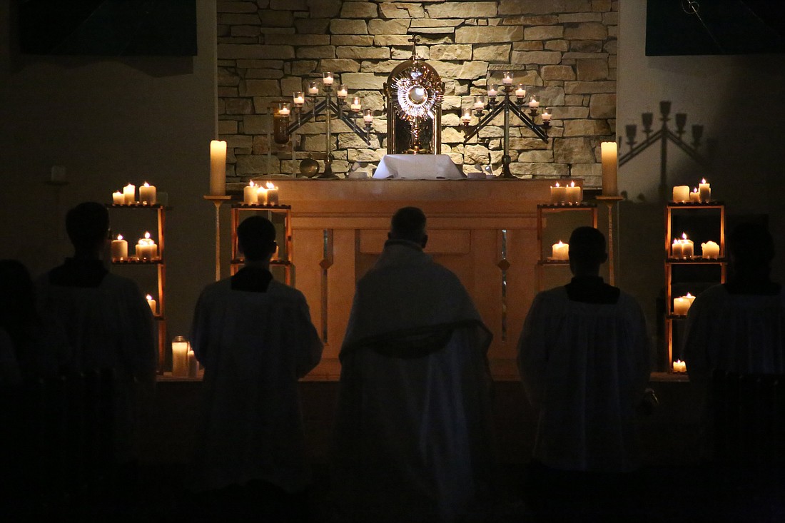 A stop on the St. Junipero Serra Route of the National Eucharistic Pilgrimage at St. Therese (North) Church in Kansas City, Mo., June 29, 2024, for KC Underground features candlelit Eucharistic adoration, contemplative praise music and confessions. The bimonthly event is organized by City on a Hill Young Adult Community, a group comprised of several thousand young adults in the Kansas City metro area. (OSV News photo/Megan Marley)