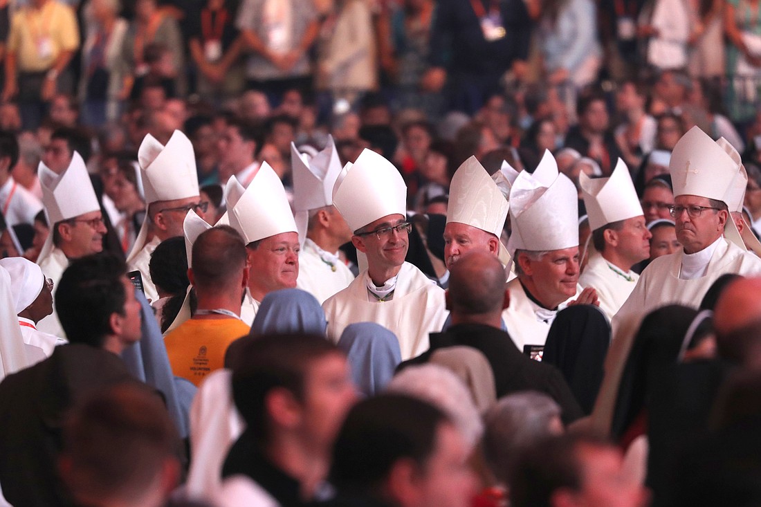 Bishops process July 21, 2024, during the final Mass of the National Eucharistic Congress at Lucas Oil Stadium in Indianapolis. (OSV News photo/Bob Roller)