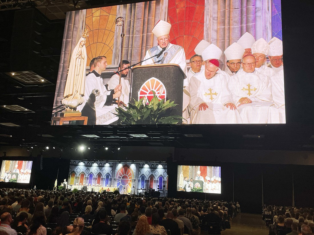 Young people listen to the homily of Archbishop Timothy P. Broglio of the U.S. Archdiocese for the Military Services, president of the U.S. Conference of Catholic Bishops, during the July 19, 2024, youth Mass at the National Eucharistic Congress. (OSV News photo/Gretchen R. Crowe)