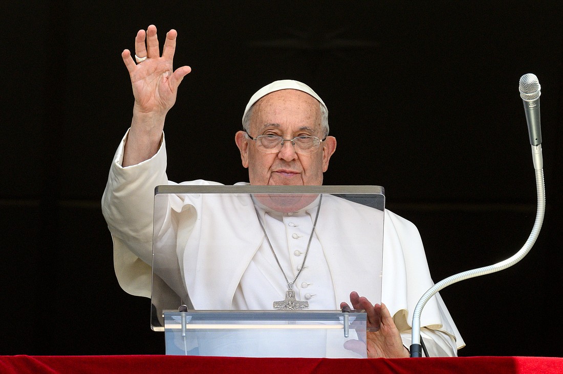 Pope Francis greets visitors gathered in St. Peter's Square to pray the Angelus at the Vatican July 21, 2024. (CNS photo/Vatican Media)