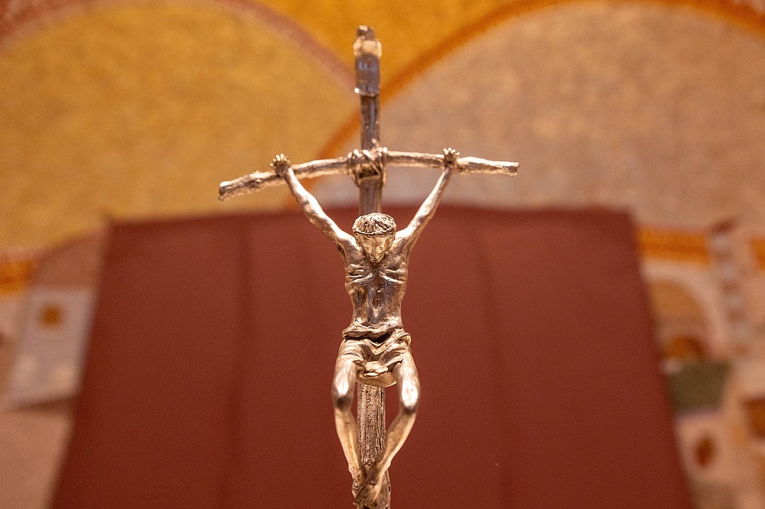 A crucifix is seen near a paper-covered mosaic of Father Marko Rupnik July 23, 2024, in the Luminous Mysteries Chapel at the St. John Paul II National Shrine in Washington. (OSV News photo/Mihoko Owada)