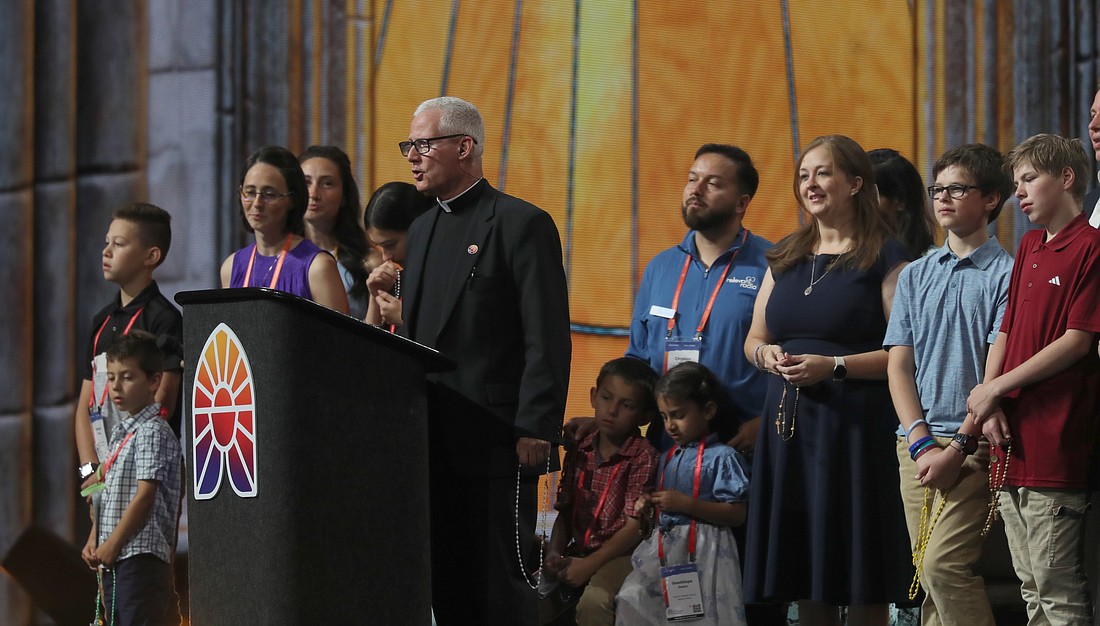 Father Francis J. Hoffman, also known as "Father Rocky" and director of Relevant Radio, the Catholic talk radio network, leads a July 21, 2024, rosary session during the final day of the National Eucharistic Congress at Lucas Oil Stadium in Indianapolis. (OSV News photo/Bob Roller)