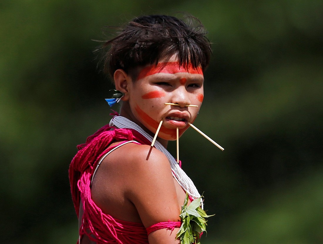 A Yanomami girl looks on as a medical team with the Brazilian army examines members of the tribe in the state of Roraima July 1, 2020, during the COVID-19 pandemic. (OSV News photo/Adriano Machado, Reuters)