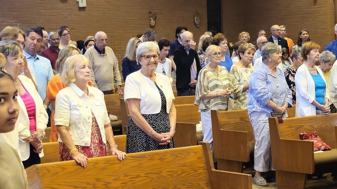 St. Joseph Sister Pat McGinley smiles during the June 16 Mass celebrating her retirement with the faith community of St. Ann Parish, Lawrenceville. Mary Stadnyk photo