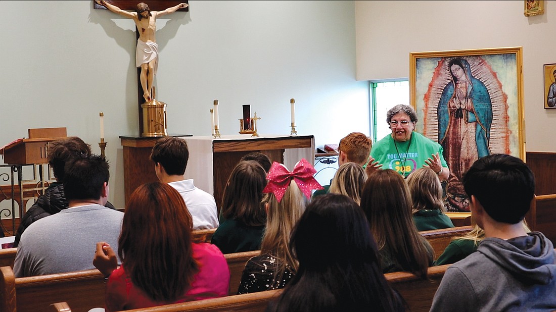 Mercy Sister Marge Scarpone, teacher in Red Bank Catholic, Red Bank, gives a presentation to students on retreat. Courtesy photo