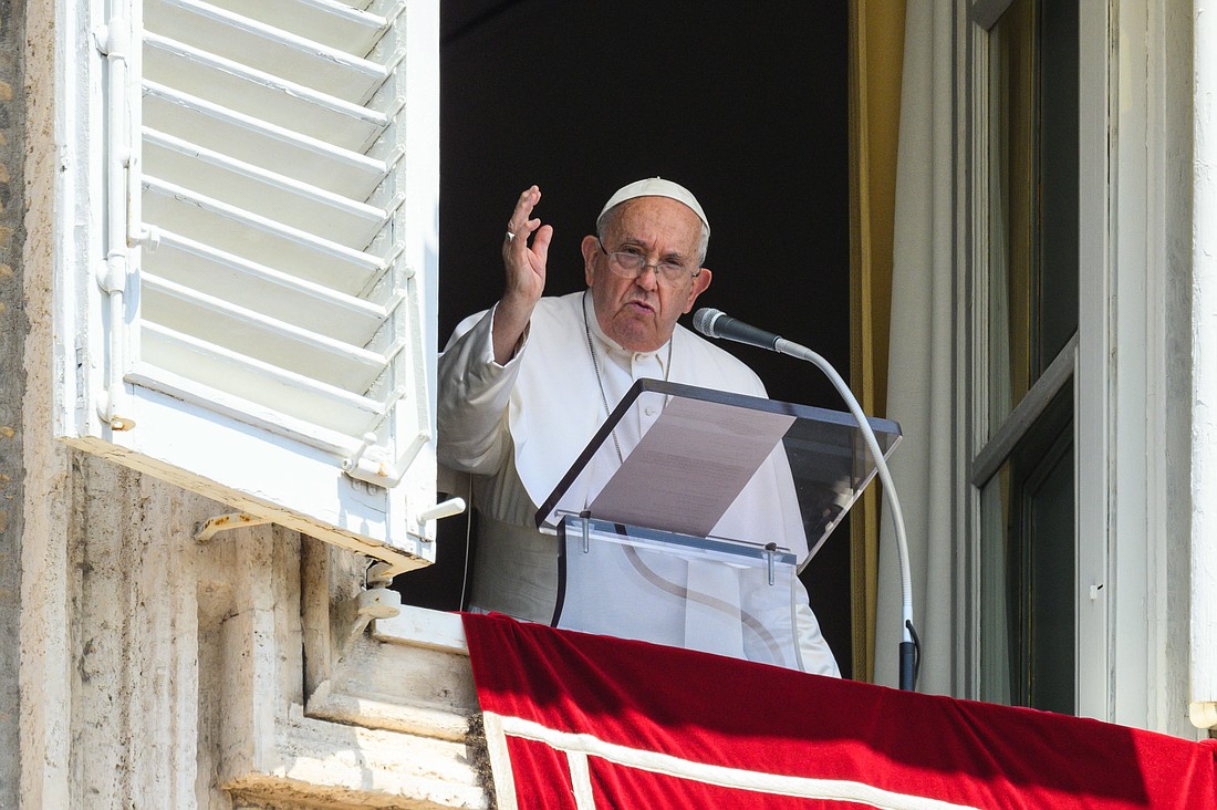 Pope Francis delivers his blessing to visitors gathered in St. Peter's Square after praying the Angelus at the Vatican July 21, 2024. (CNS photo/Vatican Media)