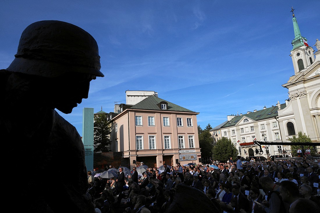 People attend a ceremony in Warsaw, Poland on July 31, 2024,  marking the 80th anniversary of the outbreak of the Warsaw Uprising 80 years ago, on Aug. 1, 1944. It lasted 63 days and was the biggest organized resistance fight in occupied Europe during World War II. (OSV News photo/Robert Kowalewski, Reuters)