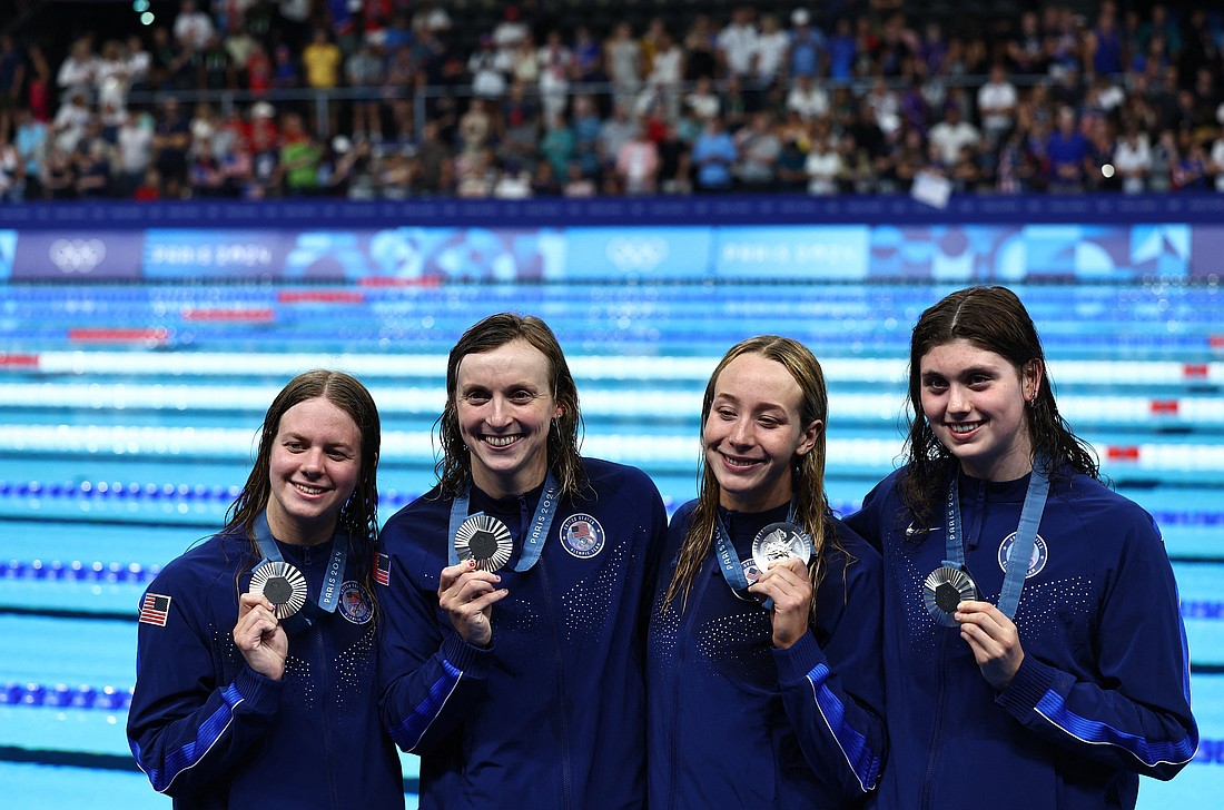 U.S. women's 4x200-meter freestyle relay silver medal winners Erin Gemmell, Katie Ledecky, Paige Madden, and Claire Weinstein, celebrate on the podium after winning Aug. 1, 2024, during the Olympic Games at Paris La Defense Arena. Gemmell and Ledecky are graduates of Stone Ridge School of the Sacred Heart in Bethesda, Md. (OSV News photo/Evgenia Novozhenina, Reuters)