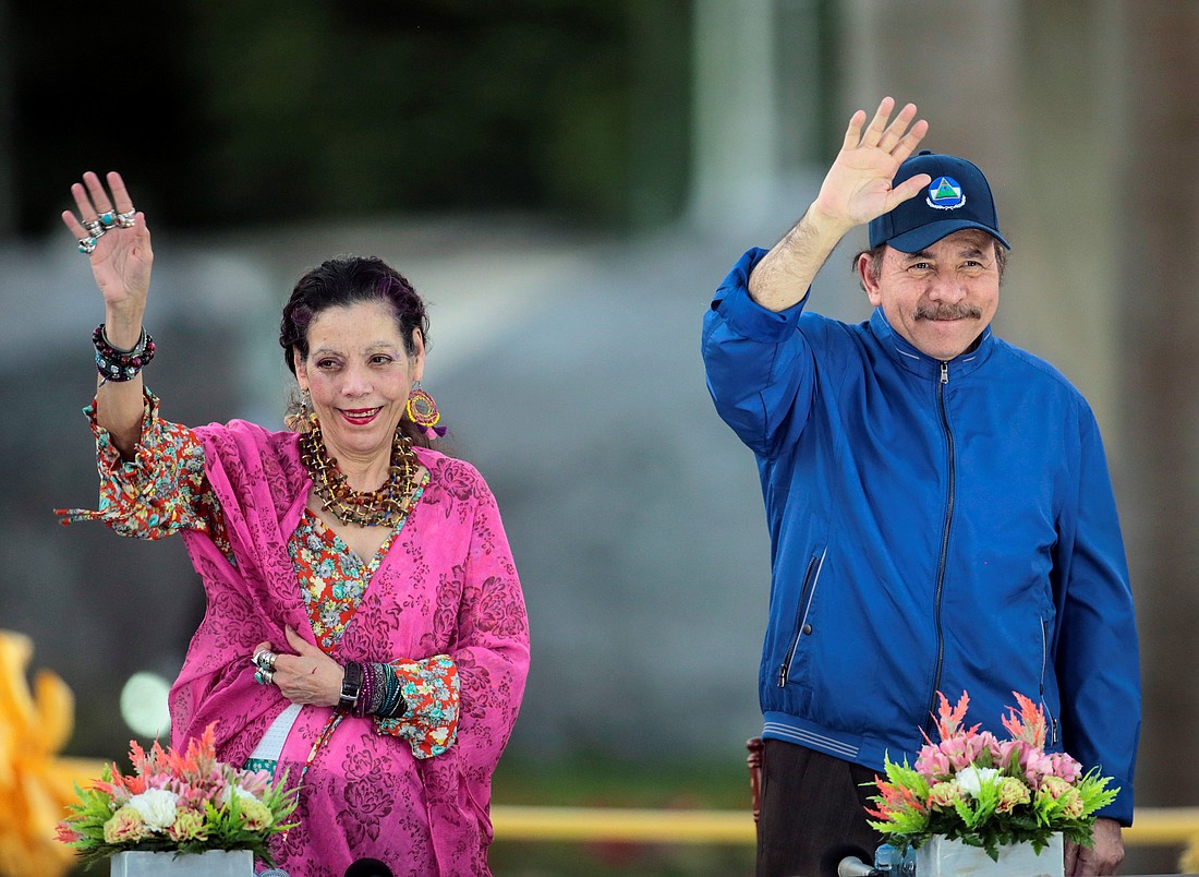 Nicaraguan President Daniel Ortega and his wife, Vice President Rosario Murillo, greet supporters during the opening ceremony of a highway overpass in Managua March 21, 2019. (OSV News photo/Oswaldo Rivas, Reuters)