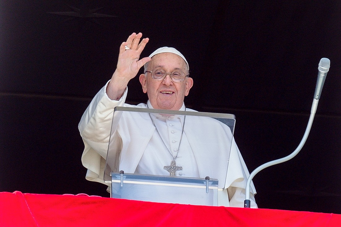 Pope Francis greets visitors gathered in St. Peter's Square to pray the Angelus at the Vatican Aug. 25, 2024. (CNS photo/Vatican Media)