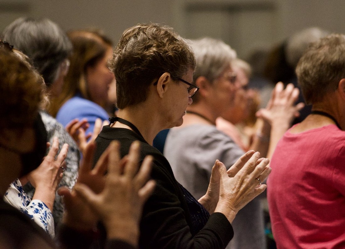 Members of the Leadership Conference of Women Religious pray at the group’s annual assembly in Orlando, Fla., Aug. 15, 2024. (OSV News photo/Dan Stockman, Global Sisters Report)