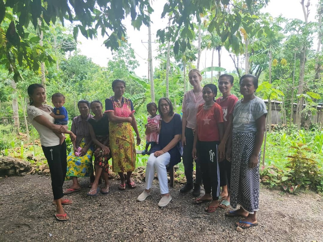 Michele Rankin, center, a volunteer with Palms Australia, is pictured in an undated photo posing with the Leohitu Women's Group in East Timor, also known as Timor-Leste, in Southeast Asia. (OSV News photo/courtesy Michele Rankin)