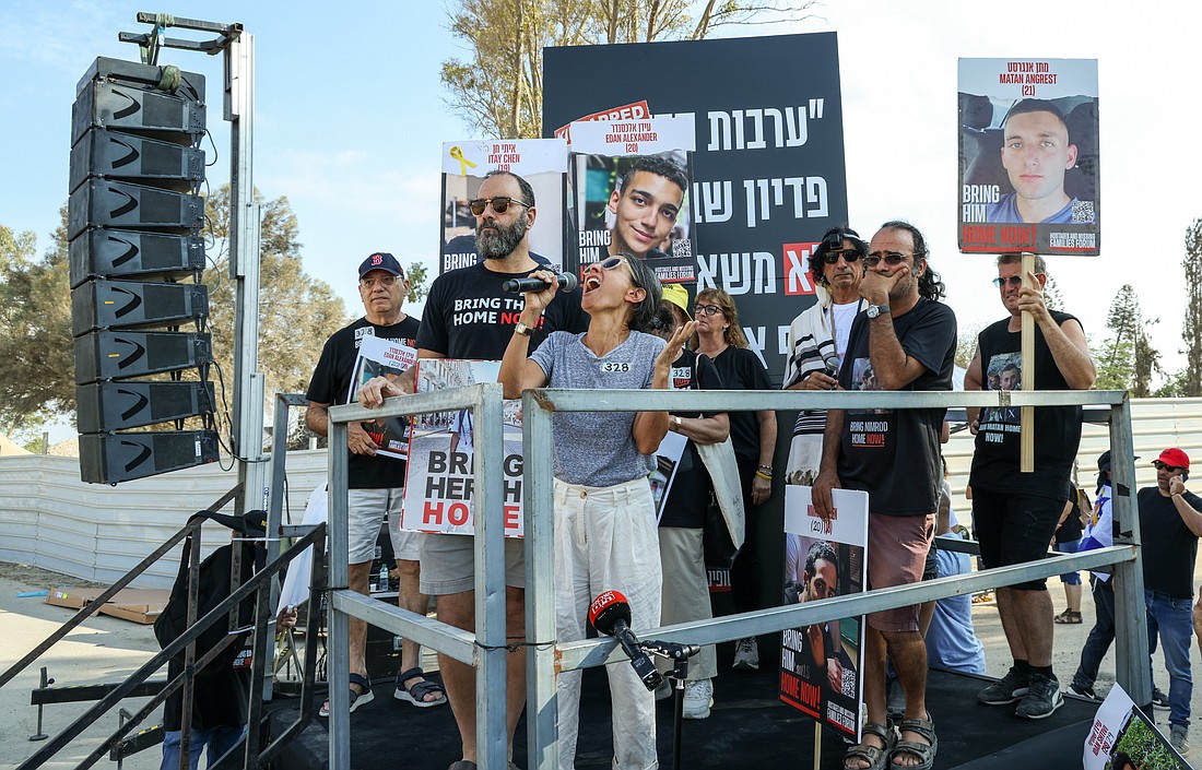 Rachel Goldberg-Polin, the mother of a 23-year-old Israeli-American abducted by Hamas and taken to Gaza Oct. 7, 2023, speaks at a rally Aug. 29, 2024, in Israel at the fence of the security zone only 1.2 miles from the Gaza Strip. She was joined by families of other hostages demanding their release. OSV News photo/Andrea Krogmann, KNA