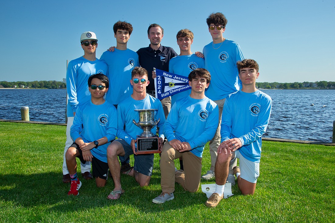 The CBA sailing team proudly displays the state championship trophy it won last spring. The Colts return several key performers from that team, providing optimism for the fall and spring seasons. Larry Levanti photo/CBA Athletics