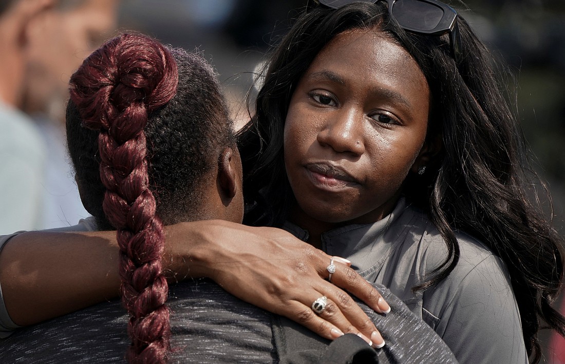 Women embrace following a shooting at Apalachee High School in Winder, Ga., Sept. 4, 2024. A 14-year-old student opened fire at the school killing at least two teachers and two students, authorities said. (OSV News photo/Elijah Nouvelage, Reuters)