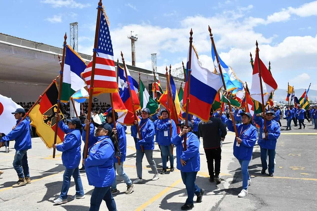 Flag bearers walk to the opening Mass of the International Eucharistic Congress in Quito, Ecuador, on Sept. 8, 2024. (OSV News photo/courtesy International Eucharistic Congress)