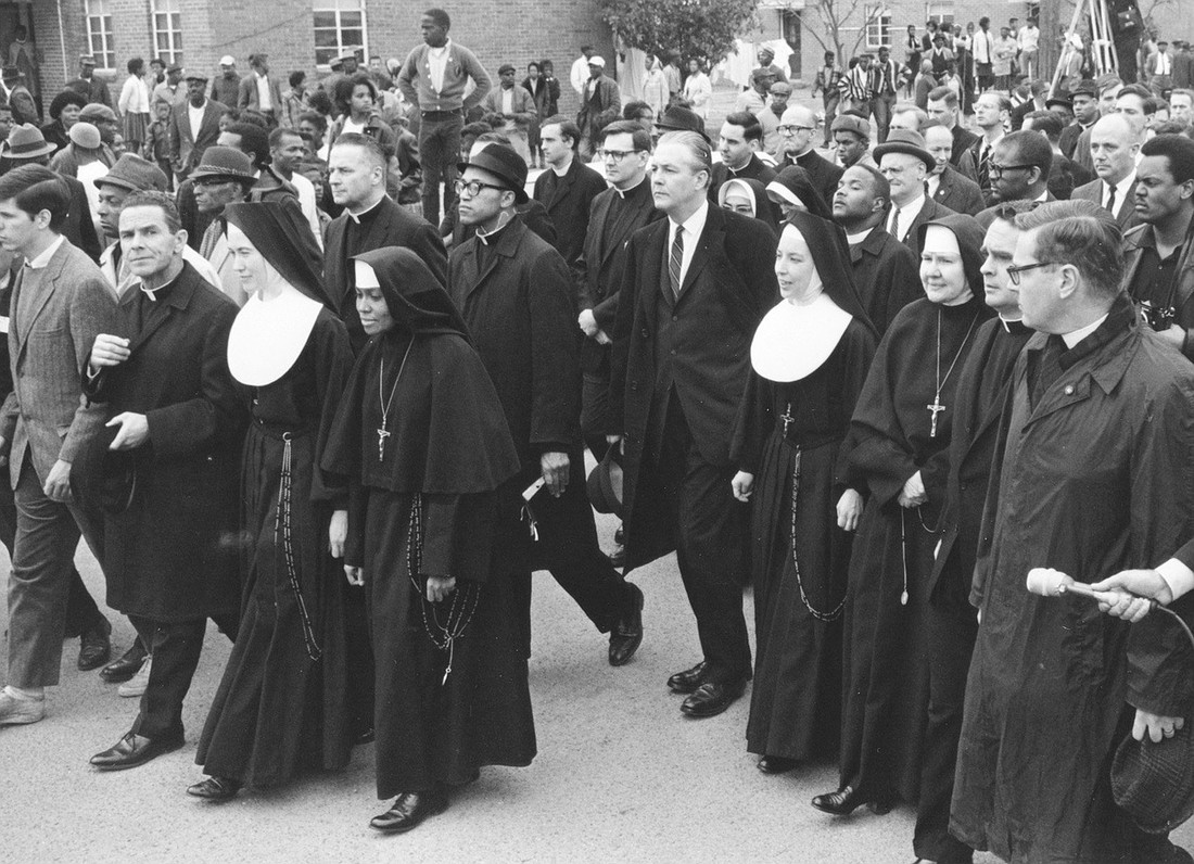 Sister Mary Antona Ebo, a Franciscan Sister of Mary, is pictured in the front row at the center with her superior, Sister Eugene Marie Smith, as they march in Selma, Ala., March 10, 1965, to support voting rights for Black Americans. A new book from Ignatius Press, "Catholic Heroes of Civil and Human Rights: 1800s to Present," tells the story of 16 different Catholics who advocated for human dignity and is set for release Sept. 13, 2024. (OSV News photo/courtesy St. Louis Review)