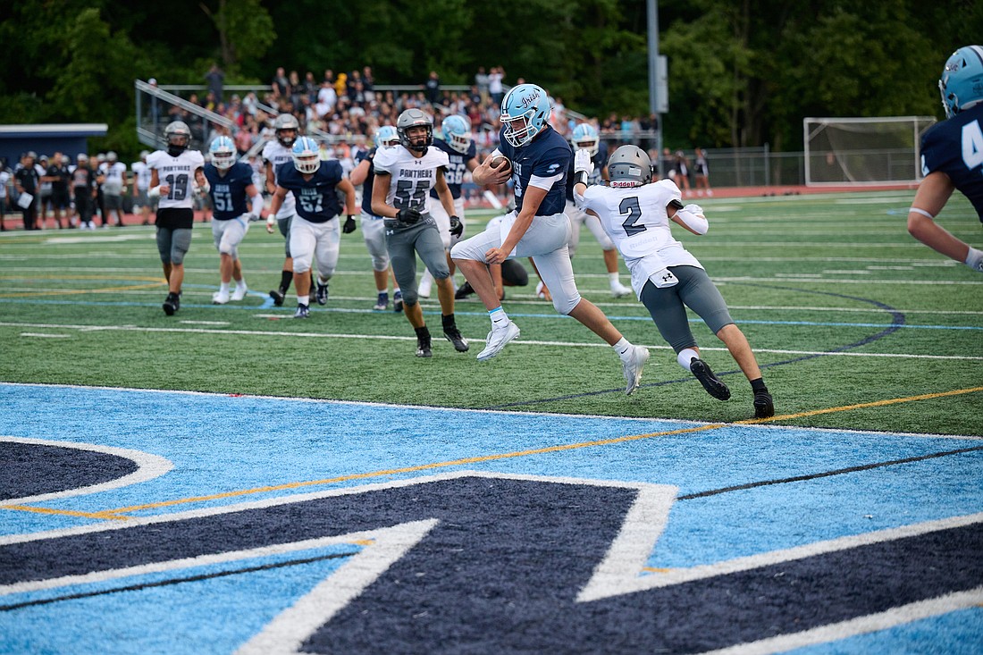 Senior Julian Matera brings the ball to the end zone in the first home game win of the season Aug. 30 for Notre Dame High School, Lawrenceville. Mike Ehrmann photo