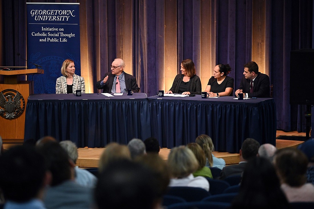 Panelists participate in Georgetown University's public dialogue on "Faith and the Faithful and the 2024 Presidential Election: Political Realities and Catholic Social Teaching" in Washington Sept. 11, 2024, hosted by the university's Initiative on Catholic Social Thought and Public Life and the Institute of Politics and Public Service. From left to right are: Kristen Soltis Anderson of Eschelon Insights, E.J. Dionne of Georgetown University, Kim Daniels (moderator) of the Initiative on Catholic Social Thought and Public Life, Nichole Flores of the University of Virginia and Sohrab Ahmari of Compact magazine. (OSV News photo/courtesy of Georgetown University, Leslie E. Kossoff)