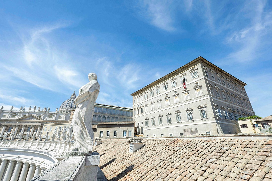 Pope Francis talks to visitors gathered in St. Peter's Square to pray the Angelus at the Vatican Sept. 15, 2024. (CNS photo/Vatican Media)