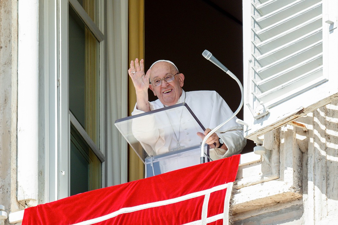 Pope Francis greets visitors gathered in St. Peter's Square to pray the Angelus at the Vatican Sept. 15, 2024. (CNS photo/Vatican Media)