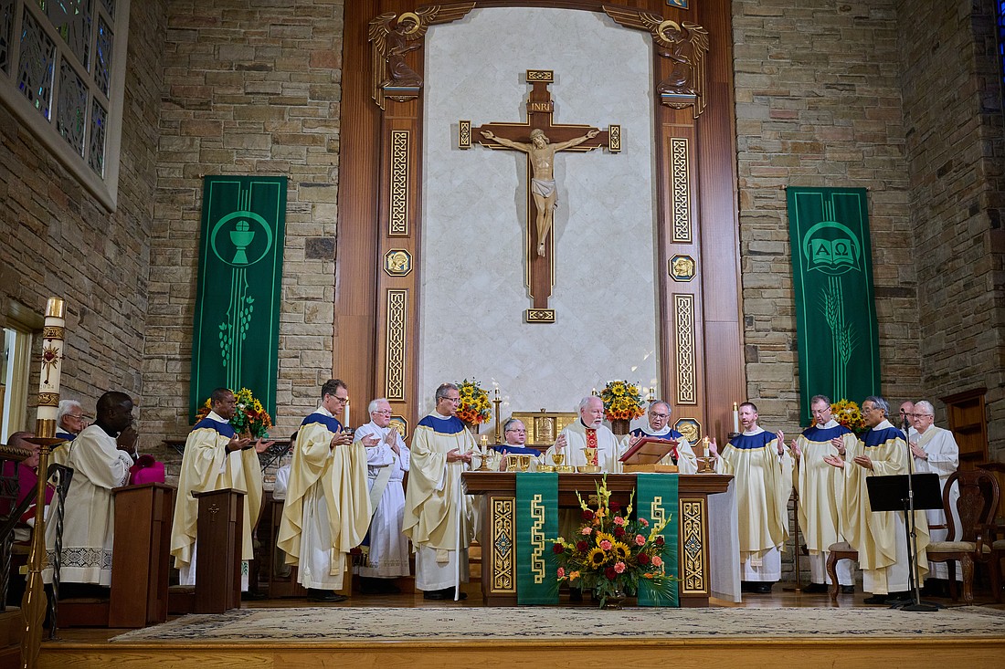 Father Charles Schwartz celebrates a Mass of Thanksgiving for his 25th anniversary of priestly ordination Sept. 20 in Sacred Heart Church, Riverton. Mike Ehrmann photo