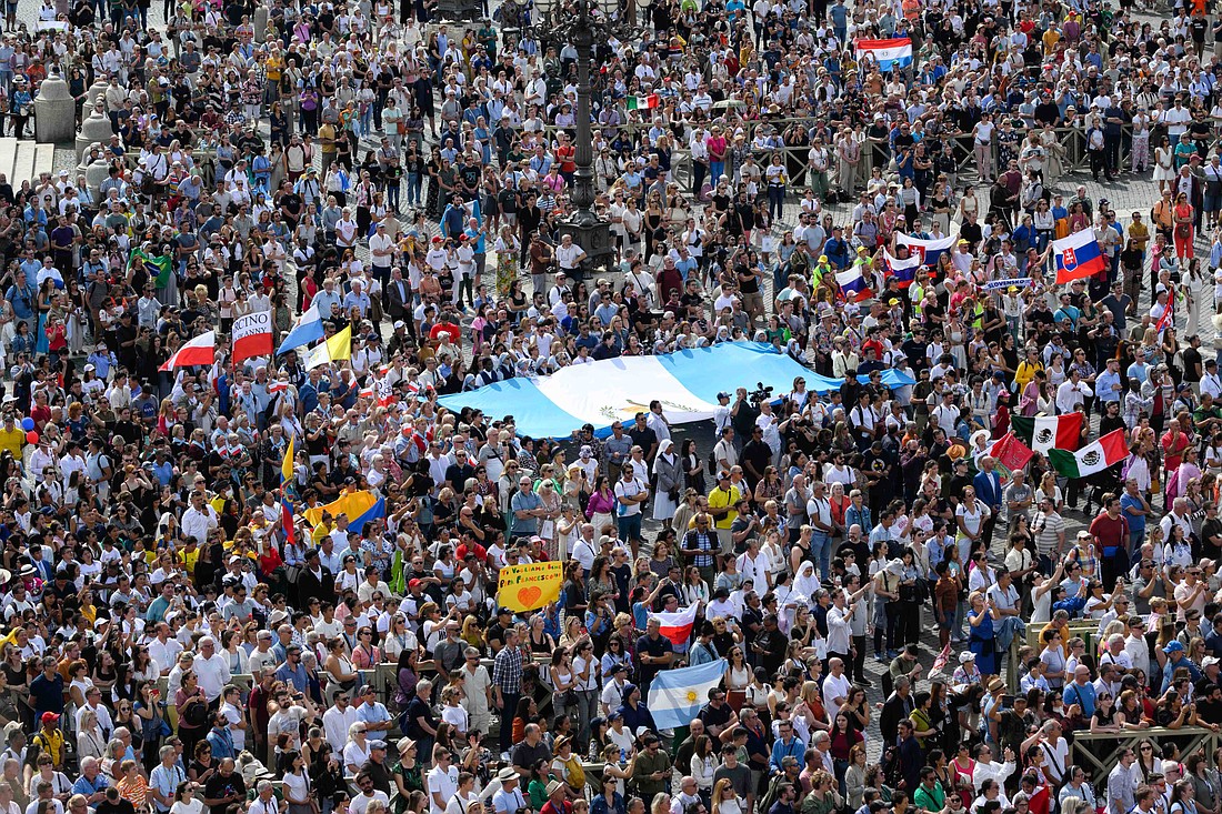 Visitors gather in St. Peter's Square to pray the Angelus with Pope Francis at the Vatican Sept. 22, 2024. (CNS photo/Vatican Media)