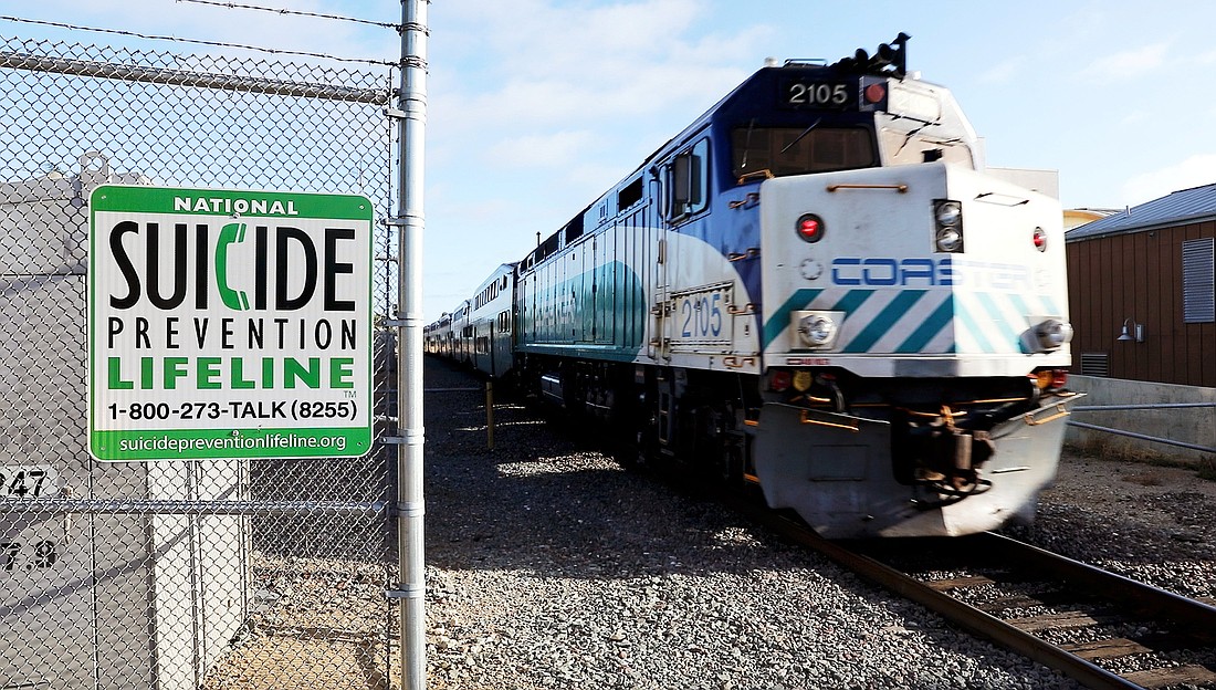 A suicide prevention sign is posted along the railway line   in Encinitas, Calif., Aug. 19, 2019. Catholic ministry leaders shared with OSV News pastoral strategies for preventing suicide, as the nation observes Suicide Prevention Month in September. (OSV News photo/Mike Blake, Reuters)