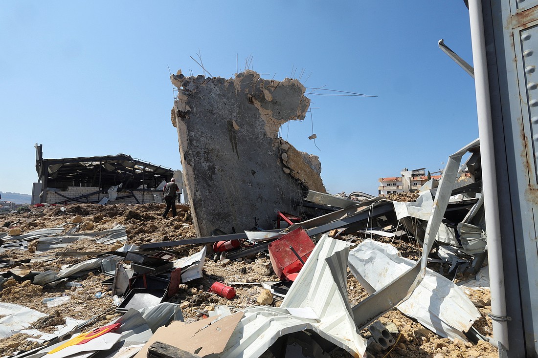 People inspect the damage at the site of an Israeli strike that hit the Lebanese seaside town of Jiyeh, Lebanon, early Sept. 25, 2024. (OSV News photo/Amr Abdallah Dalsh, Reuters)