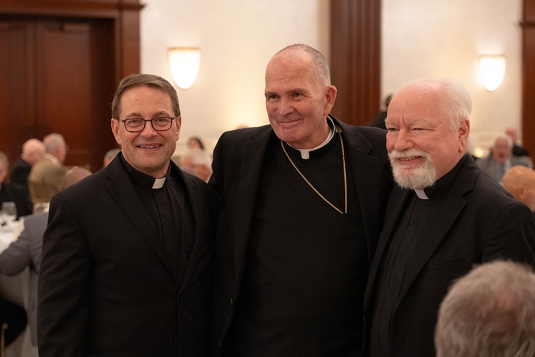 Bishop O'Connell, center, poses with Father William Lago, left, and Father Charles Schwartz, both of whom celebrate their 25th anniversaries of priestly ordination this year. Father Lago is pastor of St. Denis Parish, Manasquan, and Father Schwartz is pastor of Sacred Heart Parish, Riverton. Matt Marzorati photo