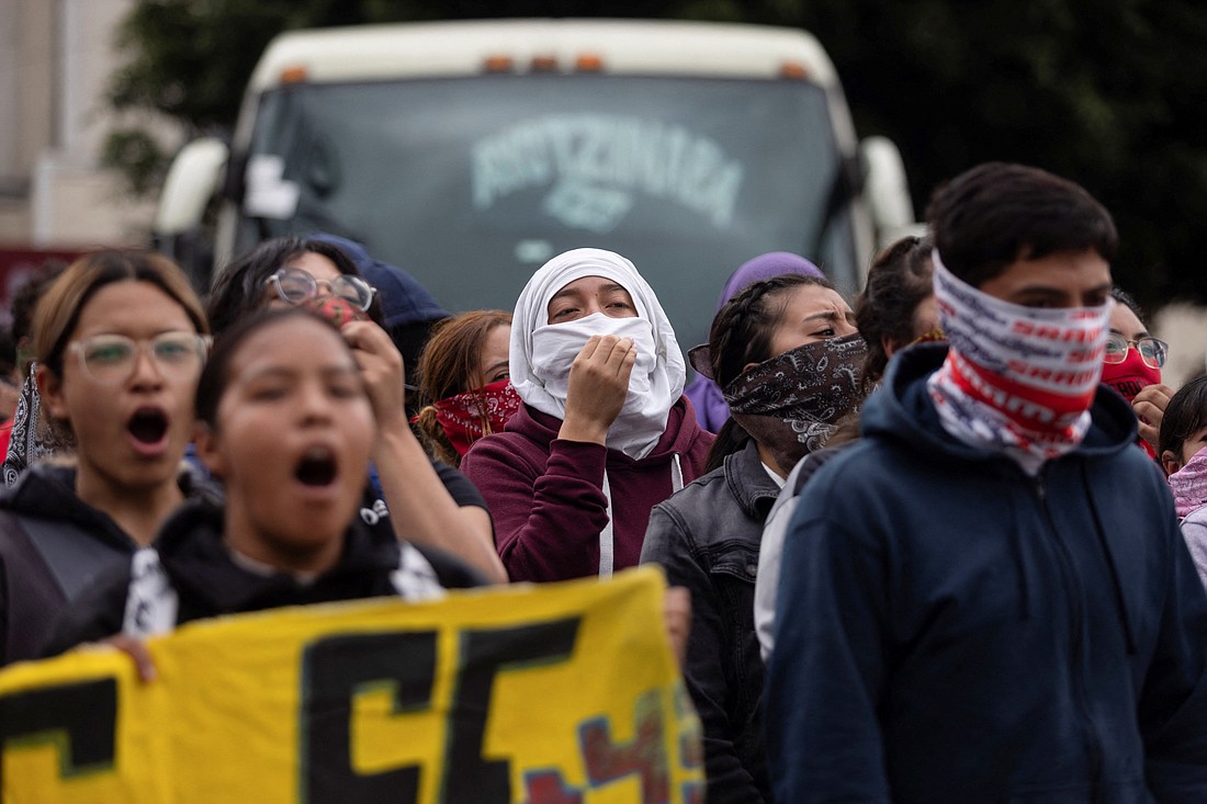 Demonstrators and students from the Ayotzinapa Rural Normal School, a rural teachers college for young men in the southern Mexican state of Guerrero, protest in Mexico City Sept. 25, 2024, ahead of the 10th anniversary of a Sept. 26, 2014, evening attack when 43 students from the school disappeared south of the city of Iguala. (OSV News photo/Quetzalli Nicte-Ha, Reuters)