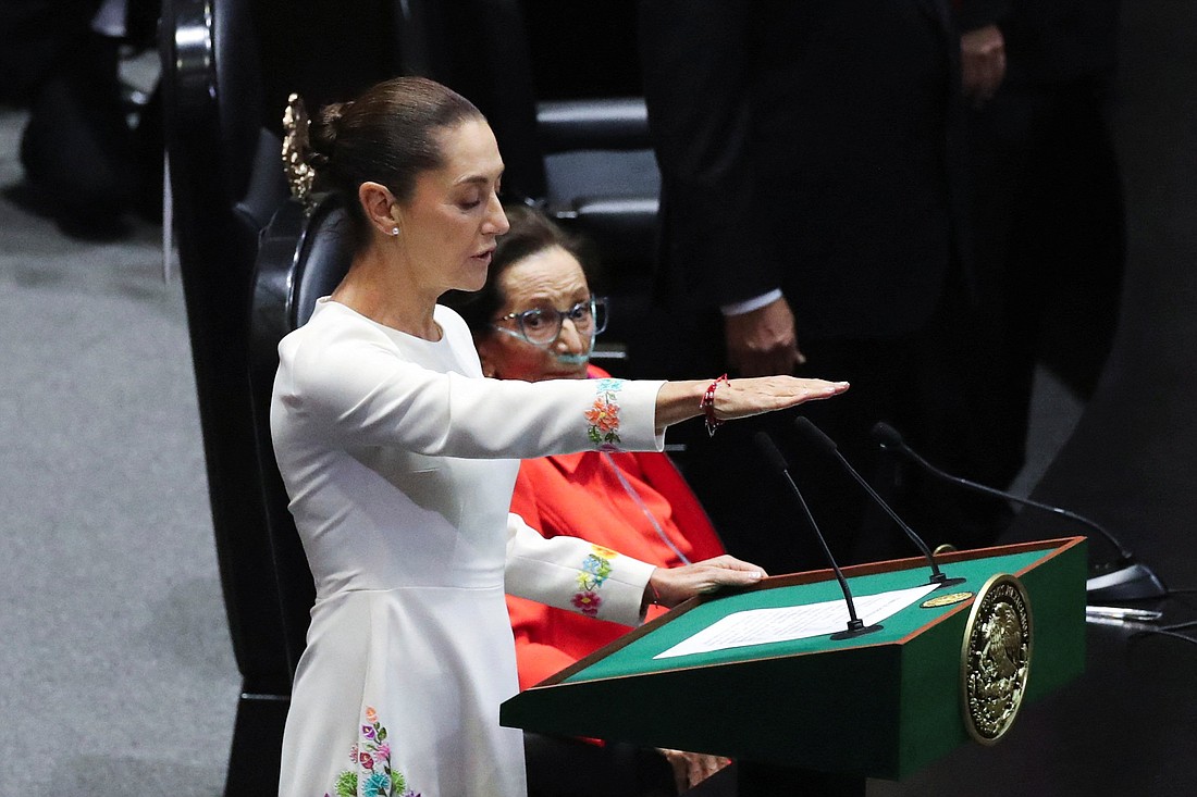 Claudia Sheinbaum takes the oath as Mexico's new president at the Congress in Mexico City Oct. 1, 2024. Sheinbaum, 62, an environmental scientist and former mayor of Mexico City, became Mexico's first female president in the nation's more than 200 years of independence. (OSV News photo/Henry Romero, Reuters)