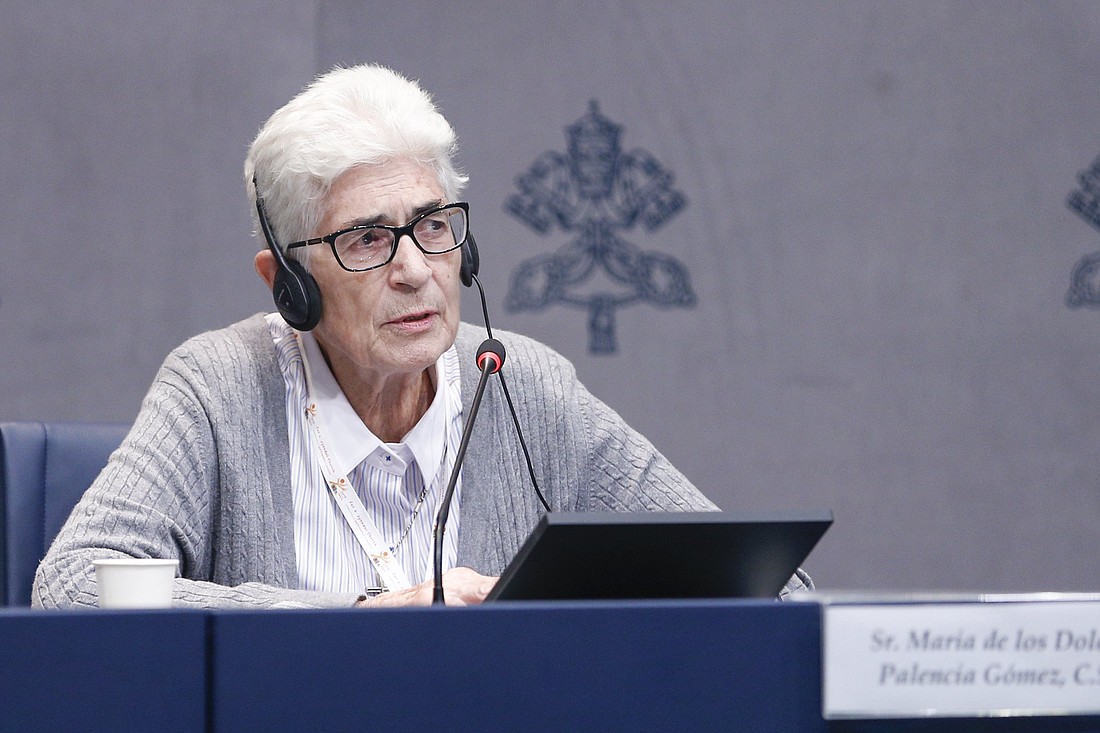 St. Joseph Sister Maria de los Dolores Palencia Gómez, one of the president delegates of the Synod of Bishops on synodality, listens to a question at a news conference in the Vatican press office Oct. 3, 2024. (CNS photo/Robert Duncan)..