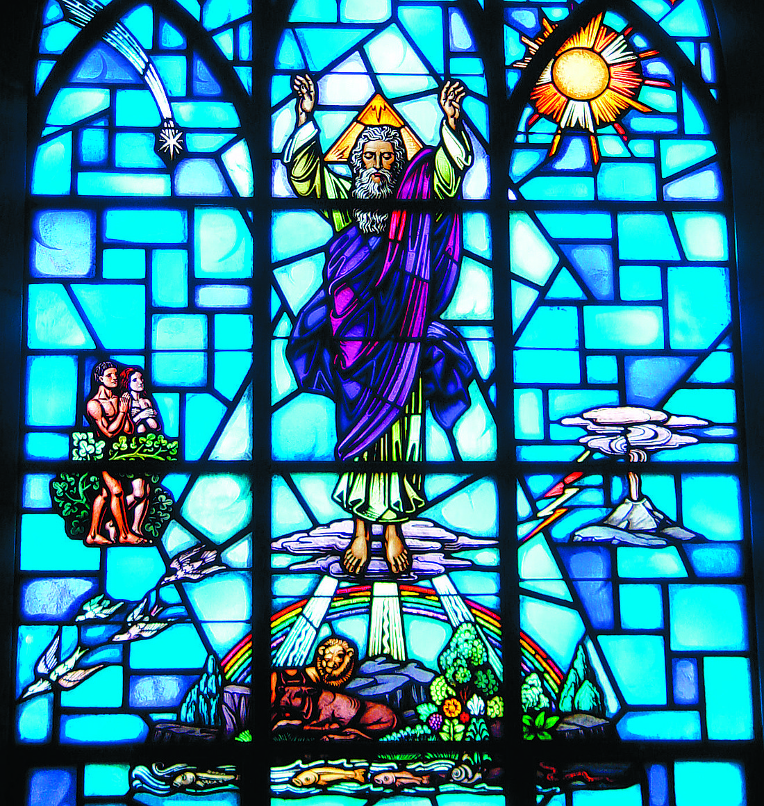 The Creation story is depicted in this stained glass image in St. Paul Church, Princeton. Father Garry Koch reflects on how God created people to love and for love. Monitor file photo