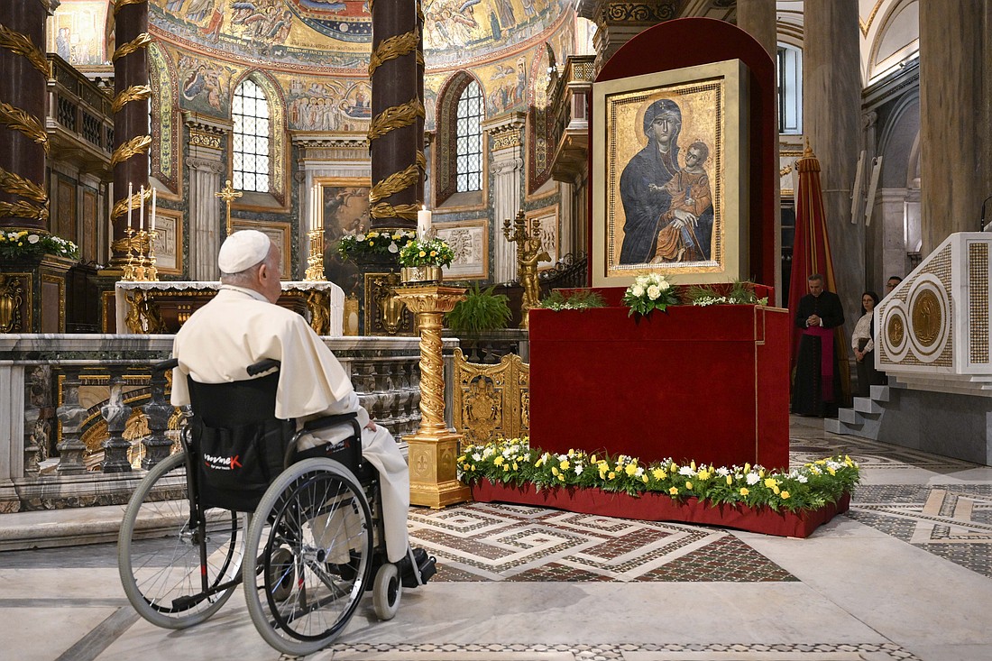 Pope Francis stops in prayer before the icon "Salus Populi Romani" ("health -- or salvation -- of the Roman people") after praying the rosary for peace in Rome's Basilica of St. Mary Major Oct. 6, 2024. (CNS photo/Vatican Media)