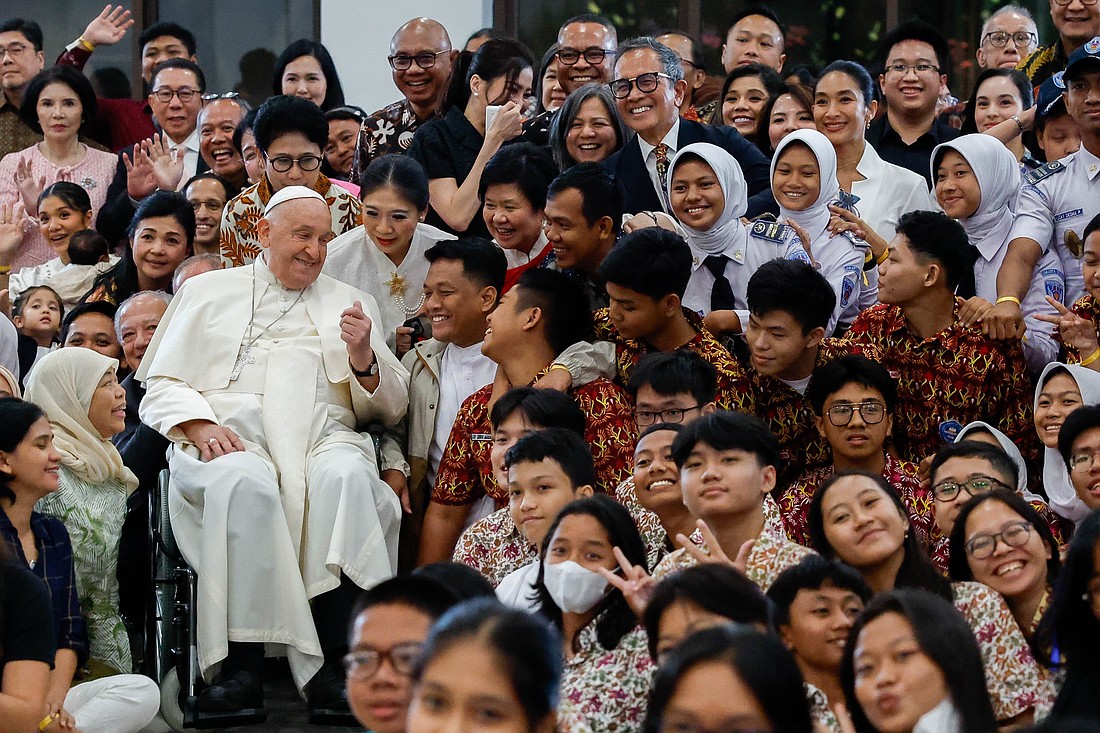 Pope Francis shares a moment with young people from Scholas Occurrentes at the Grha Pemuda Youth Center in Jakarta, Indonesia, Sept. 4, 2024. (CNS photo/Lola Gomez)