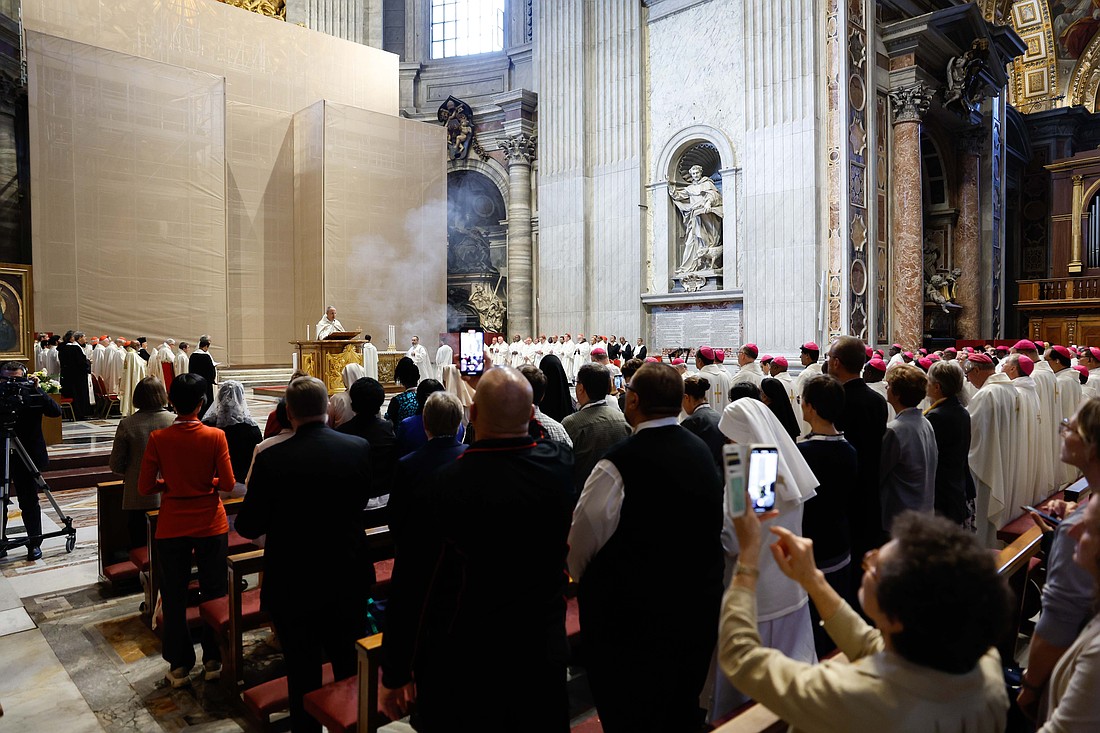Participants in the Synod of Bishops on synodality attend a Mass presided over by Maronite Auxiliary Bishop Paul Rouhana of Beirut at the Altar of the Chair in St. Peter's Basilica at the Vatican, Oct. 9, 2024. (CNS photo/Lola Gomez)