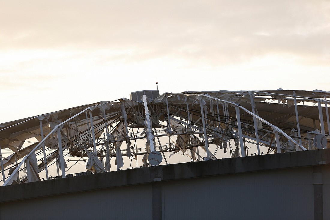 The destroyed fabric roof of Tropicana Field stadium, the home of Major League Baseball's Tampa Bay Rays, is seen in downtown St. Petersburg, Fla., Oct. 10, 2024, after Hurricane Milton made landfall the night before. (OSV News photo/Octavio Jones, Reuters)