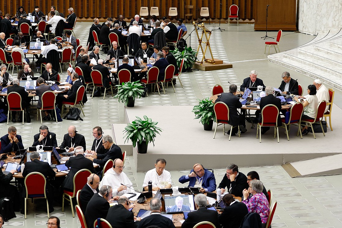 Cardinal Jean-Claude Hollerich of Luxembourg, relator general of the Synod of Bishops on synodality, speaks during the morning session in the Paul VI Audience Hall at the Vatican Oct. 15, 2024. (CNS photo/Lola Gomez)