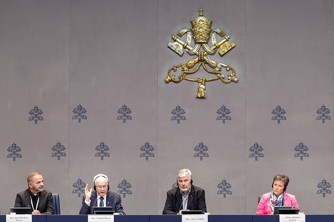 From left, Father José San Jose Prisco, dean of the faculty of canon law at the Pontifical University of Salamanca, Father Ormond Rush, a professor at the Australian Catholic University and theological expert, Father Dario Vitali, coordinator of theological experts assisting the synod and professor of dogmatic theology at Rome's Pontifical Gregorian University, and Klara-Antonia Csiszar, a professor of pastoral theology at the Catholic University of Linz, Austria, attend a press briefing on the synod at the Vatican Oct. 16, 2024. (CNS photo/Lola Gomez)