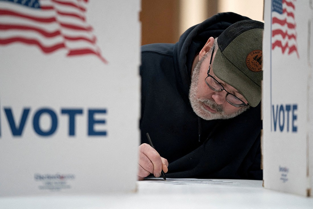 A man prepares to vote in a presidential primary election earlier this year. OSV News photo/Erica Dischino, Reuters