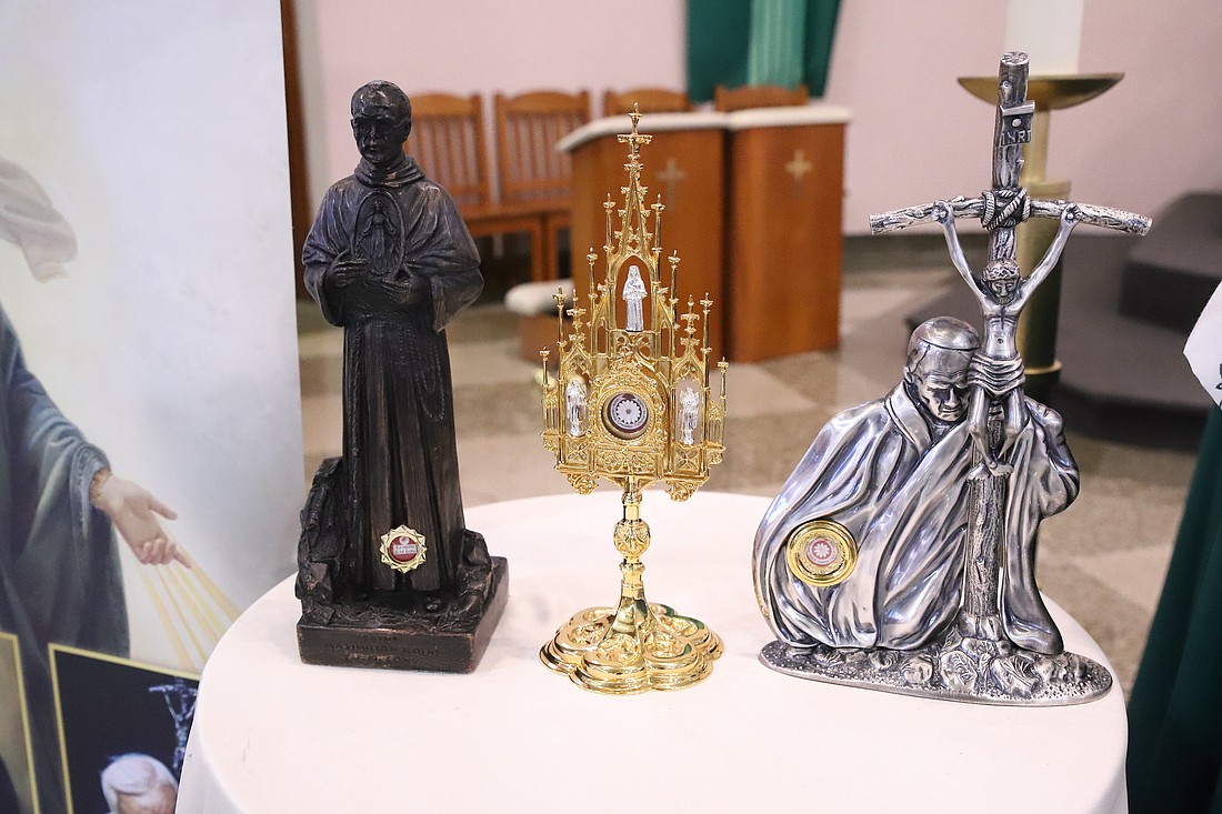 The relics of Polish saints Maximilian Kolbe, Maria Faustina Kowlaska and Pope John Paul II are displayed for veneration Aug. 18 in Our Lady of Perpetual Help Church, Seaside Heights. John Batkowski photo